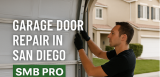 Technician repairing residential garage door in San Diego – SMB Pro Garage Door